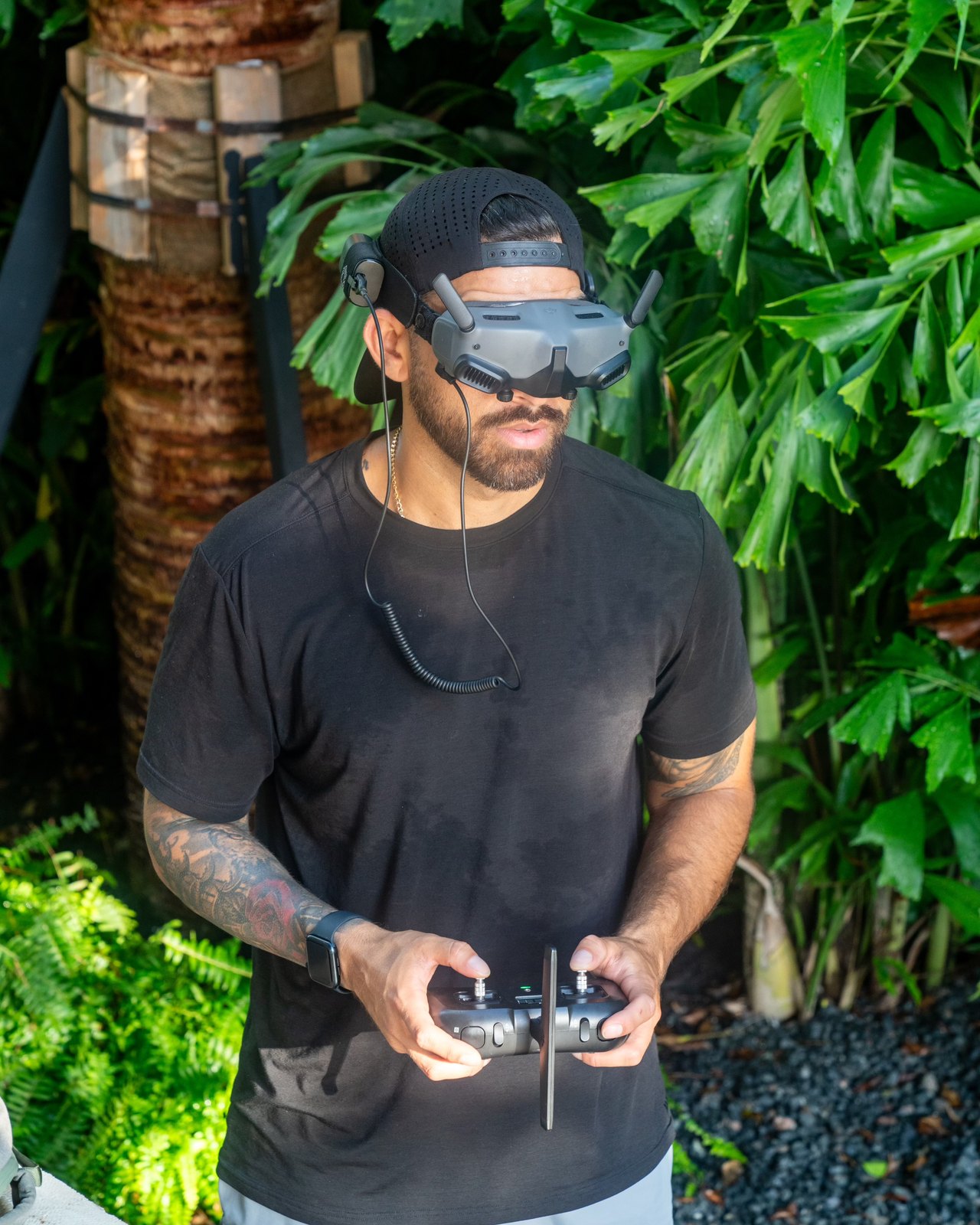 Zu Group FPV pilot operating a drone with goggles and controller